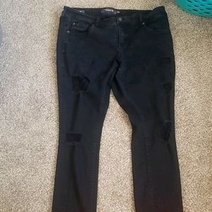 Boyfriend ripped jeans with fishnets in jeans